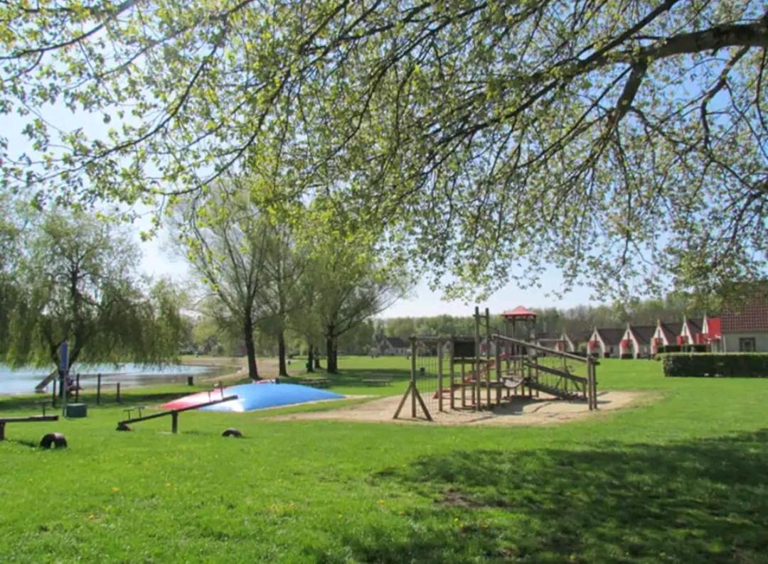 Serene Family Retreat: Garden Oasis with Lake and Playgrounds Ewijk Exterior photo